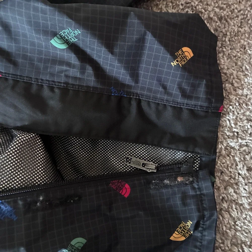 The North Face Baby DryVent Rain Jacket Black Multi Logo Grid Hooded 6-12M